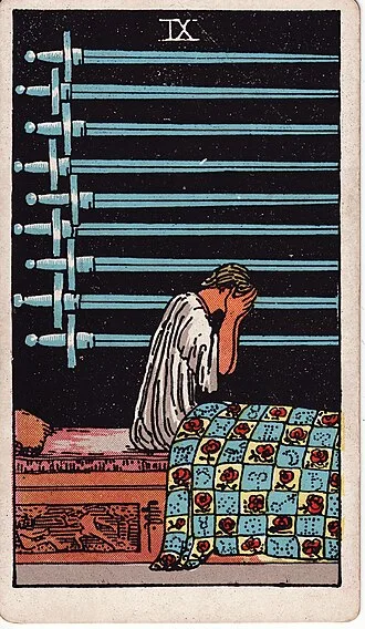 Carta del tarot Nueve de Espadas