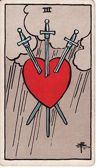 Carta del tarot Tres de Espadas
